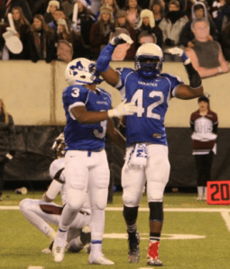 Darius Slade (right) joined by teammate Kevin Robsinson (left). Photo by 50 Yard Line Photos 